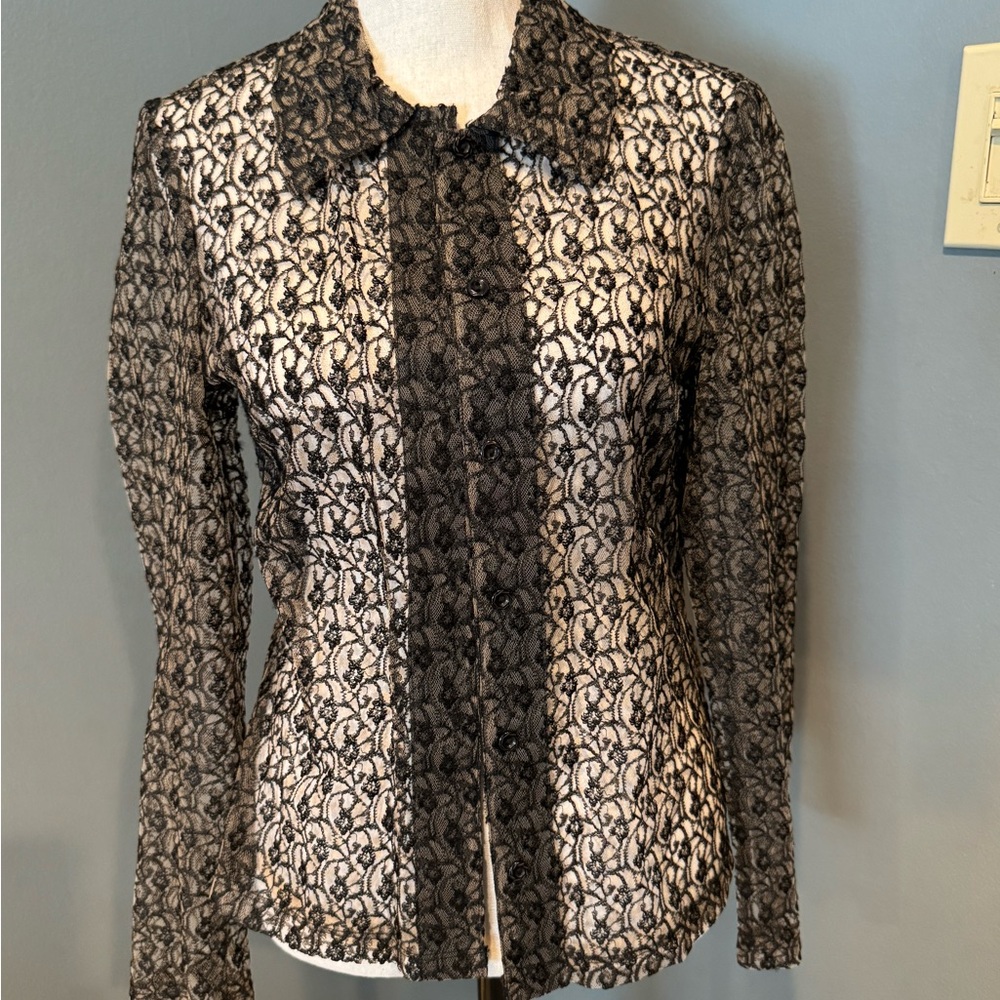Black lace blouse. Only worn a few times. Great condition.